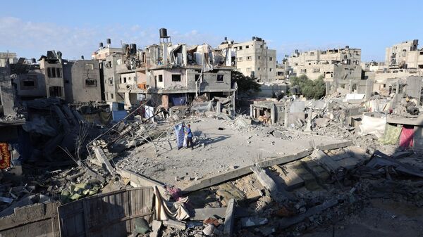 An overview of a destroyed home the day after an Israeli airstrike on the Palestinian Nuseirat refugee camp, in the central Gaza Strip on October 30, 2023. - Sputnik International