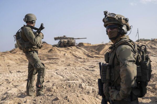 This photo released by the Israeli military shows ground operations in the Gaza Strip.  - Sputnik International
