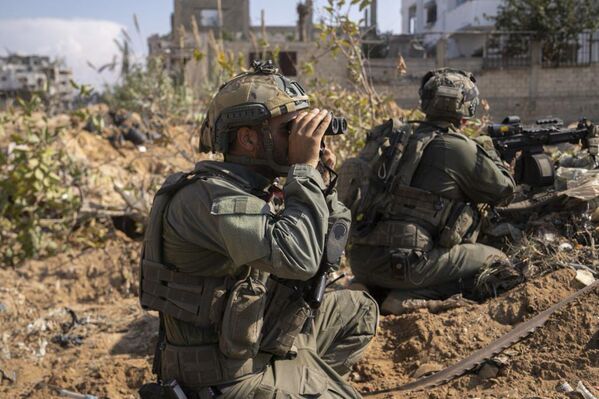 This photo released by the Israeli military shows a ground operation taking place inside the Gaza Strip. - Sputnik International