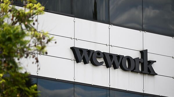 The WeWork logo is displayed outside of a shared commercial office space building in Los Angeles, California on August 8, 2023. - Sputnik International