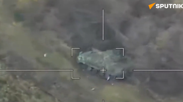 Russian Lancet Drone Destroys Ukrainian Tank  - Sputnik International