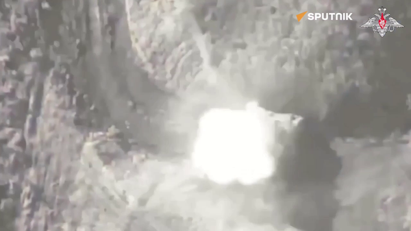 Watch Russian Forces Destroy Ukrainian Armor With Kamikaze Drone  - Sputnik International