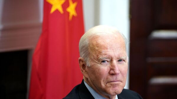 (FILES) US President Joe Biden meets with China's President Xi Jinping during a virtual summit from the Roosevelt Room of the White House in Washington, DC, November 15, 2021.  - Sputnik International