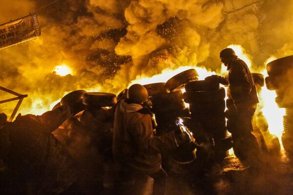 Supporters of Ukraine&#x27;s European integration take part in clashes with the police in the center of Kiev. - Sputnik International