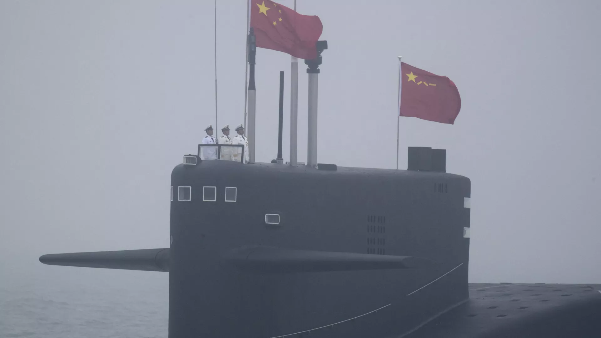 A type 094 Jin-class nuclear submarine Long March 15 of the Chinese People's Liberation Army (PLA) Navy participates in a naval parade to commemorate the 70th anniversary of the founding of China's PLA Navy in the sea near Qingdao, in eastern China's Shandong province on April 23, 2019. - Sputnik International, 1920, 21.11.2023