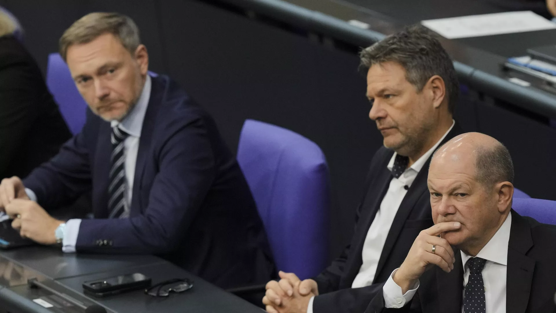 From right, German Chancellor Olaf Scholz, Economy and Climate Minister Robert Habeck and Finance Minister Christian Lindner listen to a debate about Germany's budget crisis at the parliament Bundestag in Berlin, Germany, Tuesday, Nov. 28, 2023. - Sputnik International, 1920, 10.11.2024