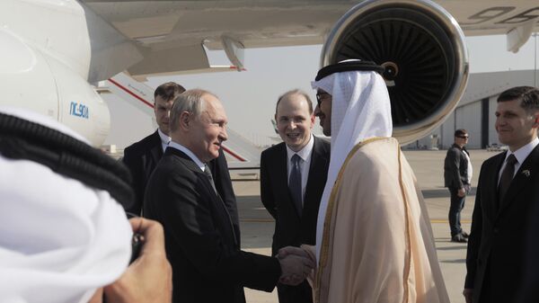 Russian President Vladimir Putin during a meeting at Abu Dhabi airport. Right: UAE Foreign Minister Sheikh Abdullah bin Zayed Al Nahyan. - Sputnik International