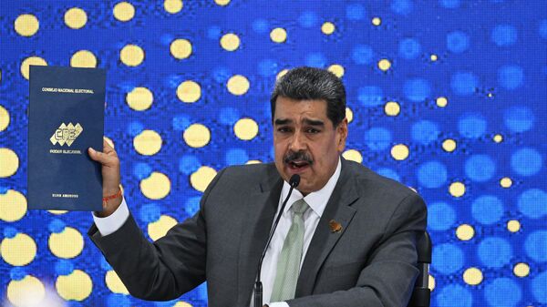 Venezuelan President Nicolas Maduro speaks during a press conference a day after the consultative referendum on Venezuelan sovereignty over the Essequibo region controlled by neighbouring Guyana, at the CNE headquarters in Caracas on December 4, 2023. - Sputnik International