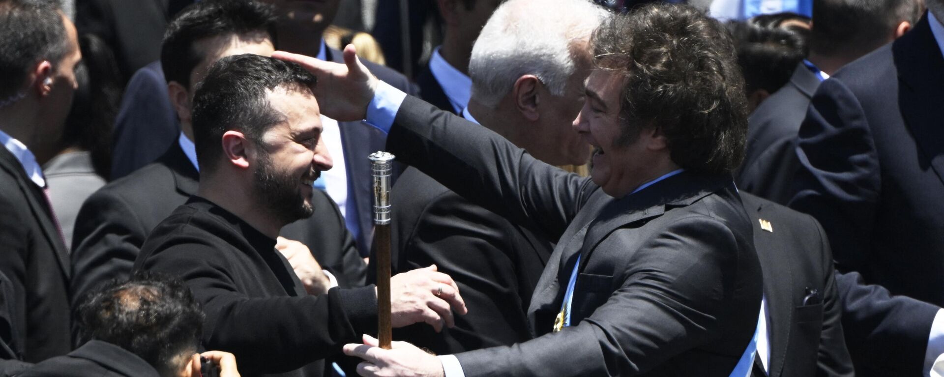 Argentina's new president Javier Milei (R) is greeted by Ukraine's President Volodymyr Zelensky after delivering his inaugural speech before the crowd during an inauguration ceremony at the Congress in Buenos Aires on December 10, 2023. - Sputnik International, 1920, 10.12.2023
