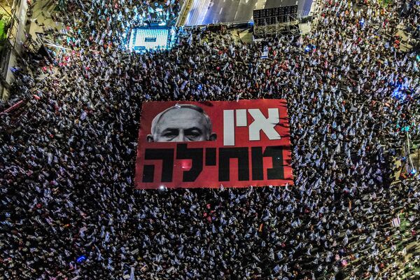 It was not just the Gaza crisis that put a massive strain on the Israeli PM Benjamin Netanyahu. Earlier this year, the country saw an unprecedented civil unrest as a direct response to the widely unpopular judicial reform that shocked the very core of Israeli society. (Demonstrators unfurling a giant banner against Israeli PM Benjamin Netanyahu during a rally against the government&#x27;s judicial overhaul plan in Tel Aviv, September 23, 2023. - Sputnik International