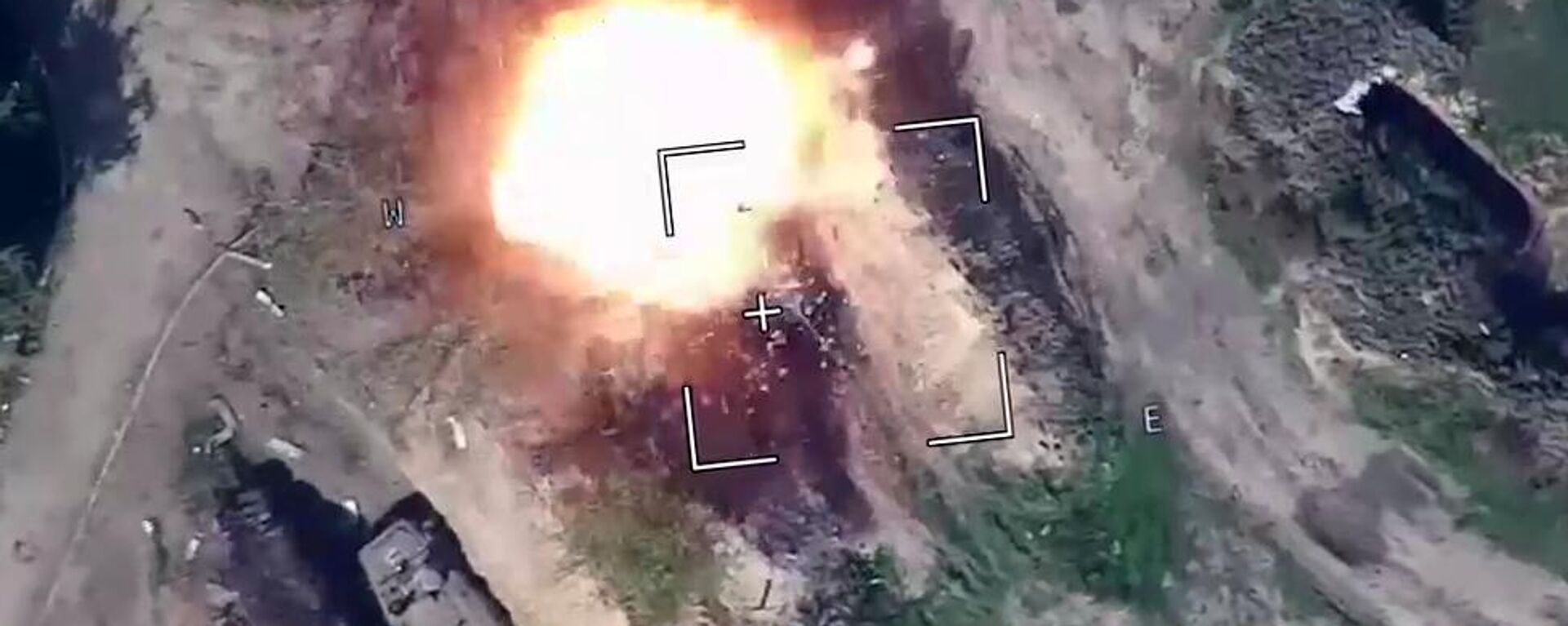 In this handout video grab taken from footage released by the Russian Defence Ministry, a view shows air strikes carried out by Russia's self-destructing suicide drone Lancet hitting, according to the ministry, vehicles of Ukrainian troops in the course of Russia's military operation in Ukraine, at the unknown location.  - Sputnik International, 1920, 14.12.2023