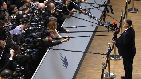 Hungary's Prime Minister Viktor Orban speaks with the media at the EU summit. - Sputnik International
