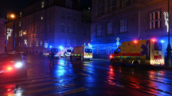 Ambulances and police cars are seen near the Charles University in central Prague, on December 21, 2023. A gunman killed 10 people and wounded dozens of others at a Prague university on December 21, 2023, before the police eliminated him, authorities said. - Sputnik International