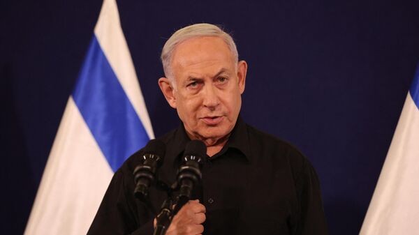 Israeli Prime Minister Benjamin Netanyahu speaks during a press conference in the Kirya military base in Tel Aviv on October 28, 2023 amid ongoing battles between Israel and the Palestinian group Hamas. - Sputnik International