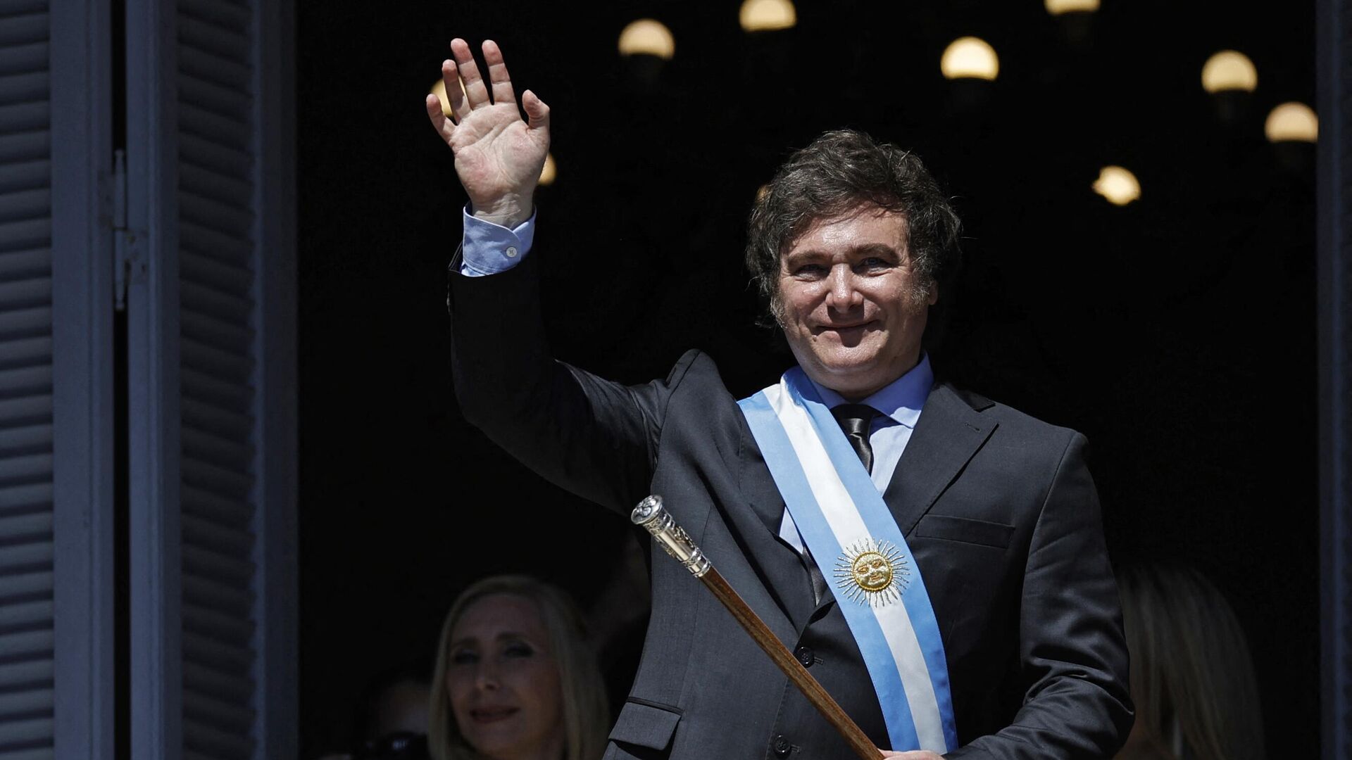 Argentina's president Javier Milei waves at the crowd from a balcony of the Casa Rosada government palace. - Sputnik International, 1920, 30.12.2023