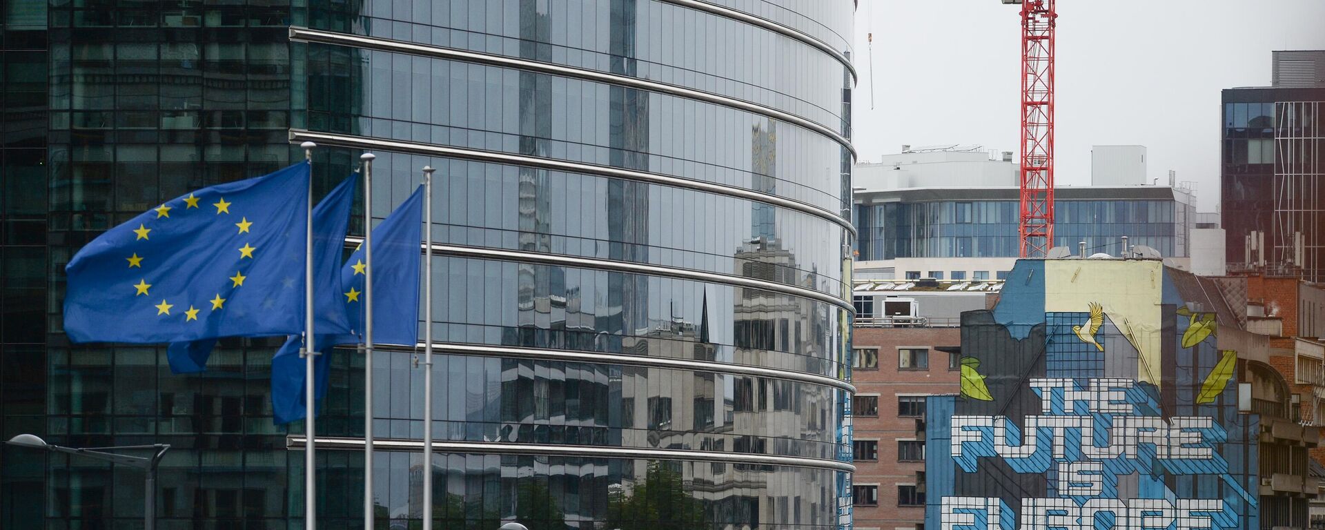 European Union flags flutter outside the EU Commission headquarters in Brussels, Belgium. - Sputnik International, 1920, 20.01.2024