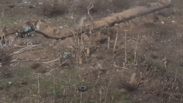 Screengrab of Sputnik video showing Ukrainian blocking unit targeting its own soldiers during a retreat. - Sputnik International