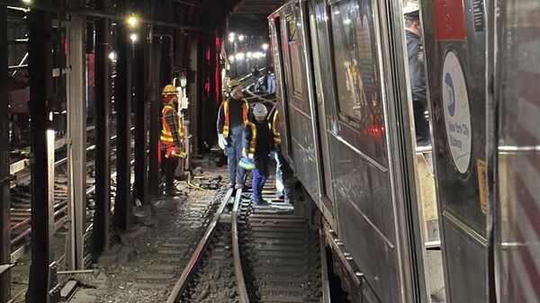 This photo provided by NYC Emergency Management shows the derailment of a New York City subway car, Thursday, Jan. 4, 2024. A New York City subway train derailed Thursday after being sideswiped by another train, leaving more than 20 people with minor injuries including some who were brought to hospitals, the New York City Police Department said.  - Sputnik International