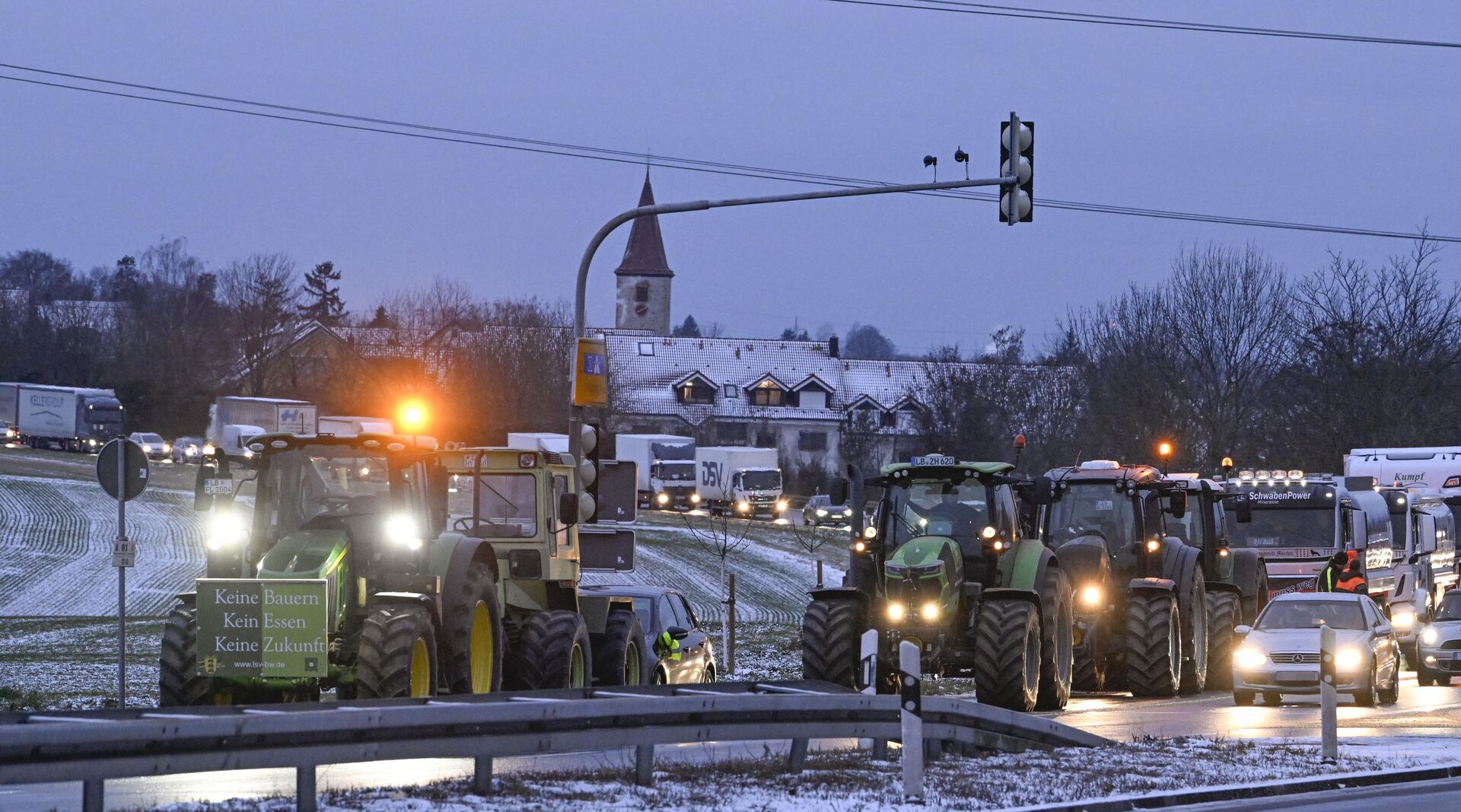 Farmers on their tractors cause a traffic jam as they protest against the federal government's austerity plans in Ludwigsburg, southern Germany on January 8, 2024.  - Sputnik International, 1920, 08.01.2024