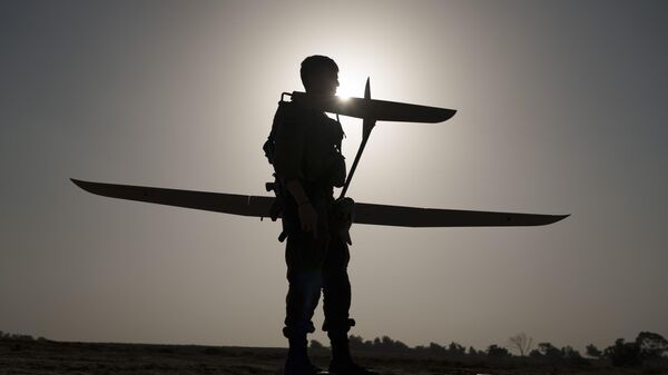 Israeli trooper using a drone on the border with Gaza. File photo. - Sputnik International