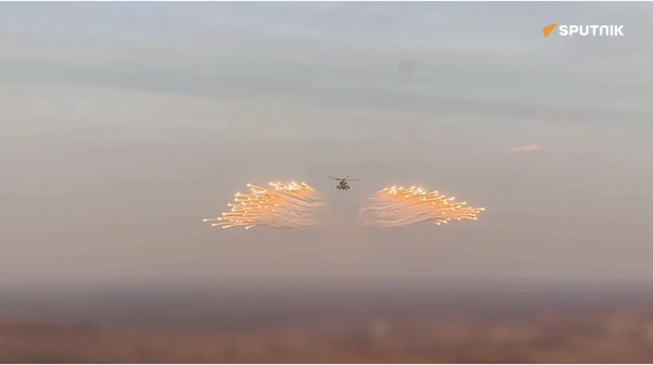 Russian helicopters in combat action in special op zone - Sputnik International