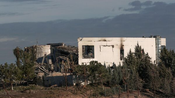 A picture shows a view of a damaged building following a missile strike. - Sputnik International