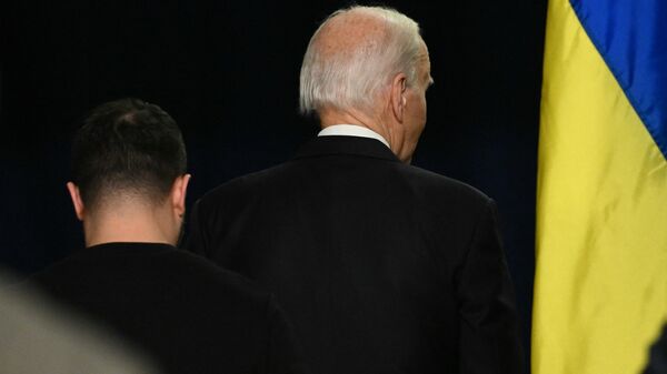 US President Joe Biden and Ukrainian President Volodymyr Zelensky leave after holding a press conference at the White House in Washington, DC, December 12, 2023. - Sputnik International