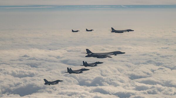 U.S. Air Force B-1B bombers, F-16 fighter jets, South Korean Air Force F-15K fighter jets and Japanese Air Force F-2 fighter jets fly over South Korea's southern island of Jeju during a joint air drill, Wednesday, Dec. 20, 2023  in a show of force against North Korea. - Sputnik International