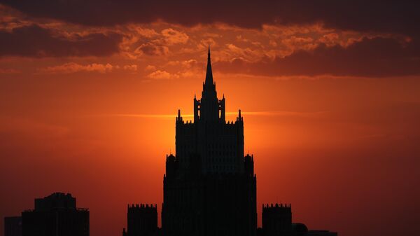 Russian Foreign Ministry's building is silhouetted against the setting sun, in Moscow, Russia.  - Sputnik International