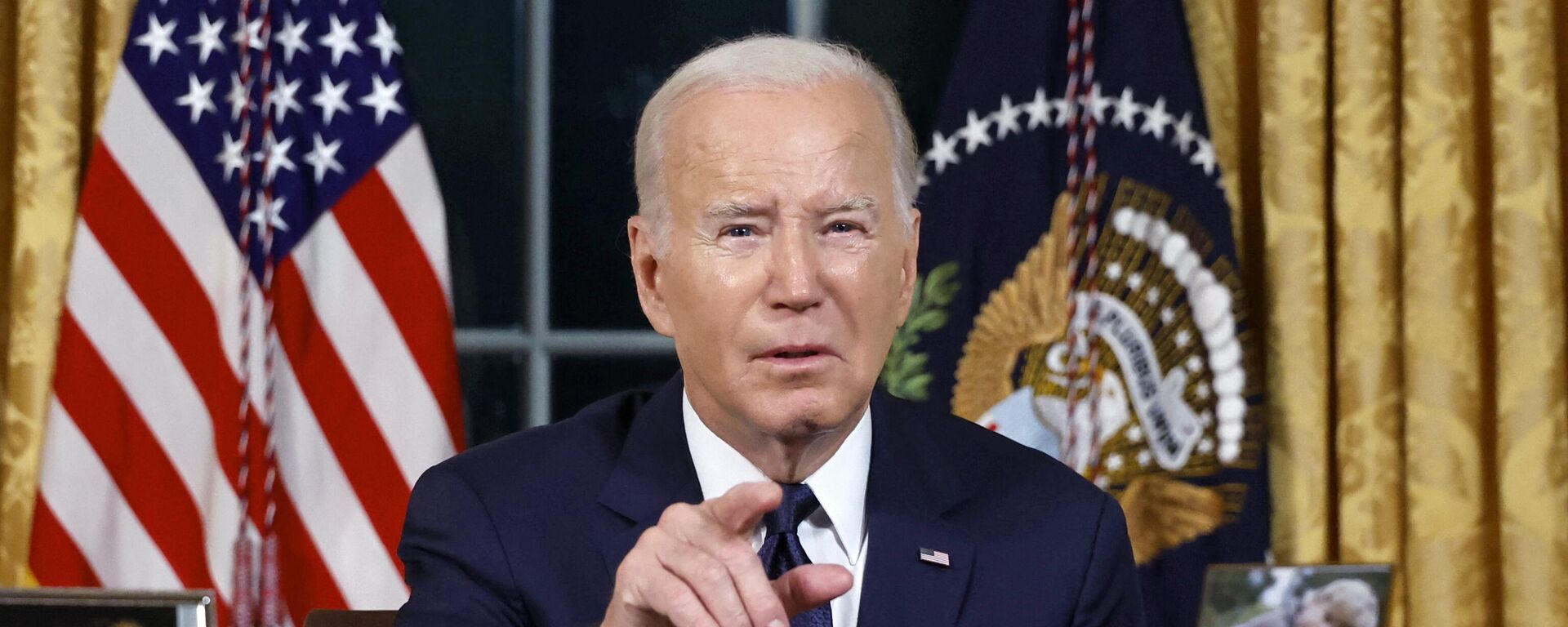 US President Joe Biden addresses the nation on the conflict between Israel and Gaza and the Russian invasion of Ukraine from the Oval Office of the White House in Washington, DC, on October 19, 2023 - Sputnik International, 1920, 18.01.2024