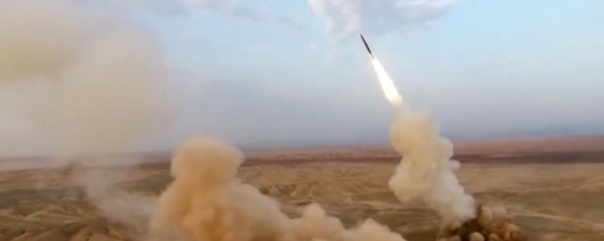 This frame grab from video shows the launching of underground ballistic missiles by the Iranian Revolutionary Guard during a military exercise, July 29, 2020. Iran's paramilitary guard launched underground ballistic missiles as part of an exercise involving a mock-up aircraft carrier in the Strait of Hormuz, state television reported Wednesday - Sputnik International, 1920, 17.02.2024