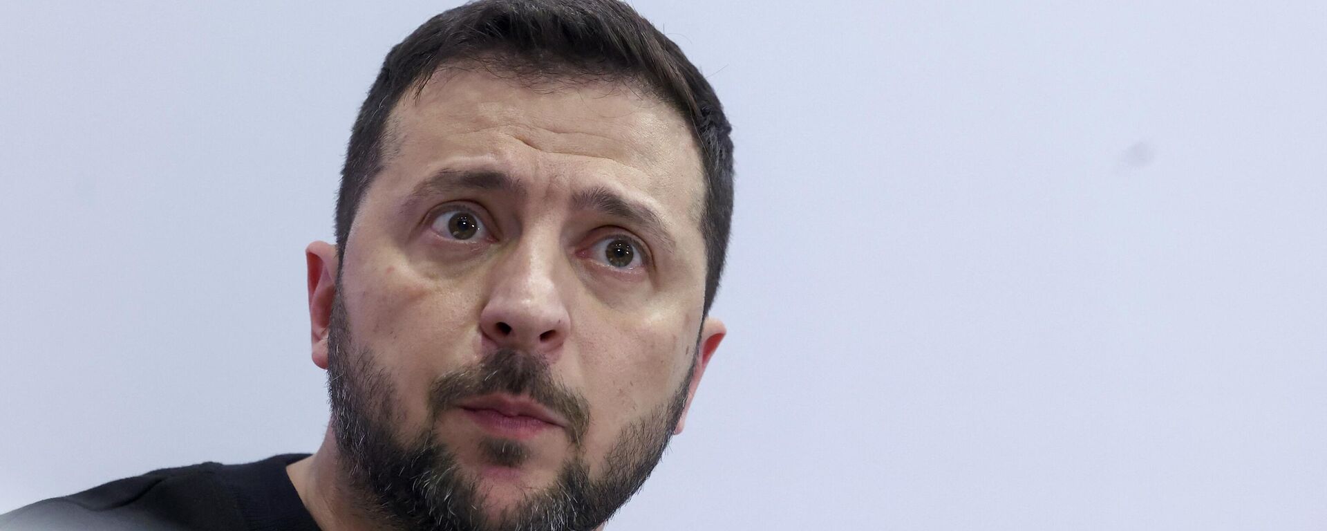 Ukraine's President Volodymyr Zelensky reacts during a joint press conference with Belgium's Prime Minister Alexander De Croo (not pictured) in Brussels on October 11, 2023 - Sputnik International, 1920, 15.02.2024