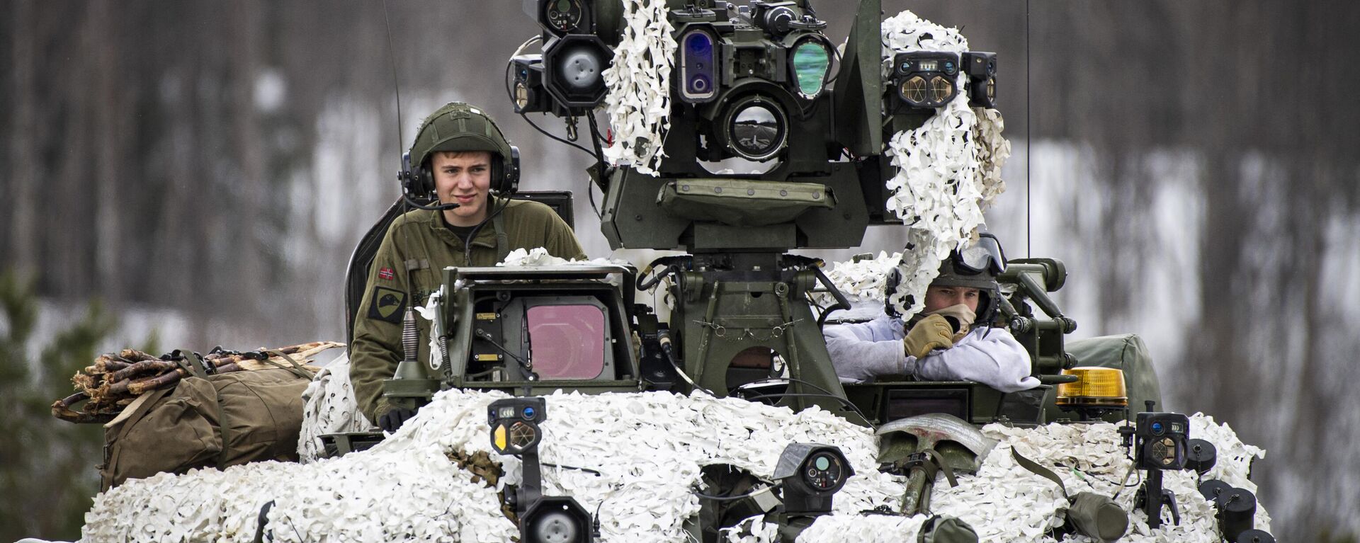 Soldiers from the Norwegian Armed Forces operate a tank as they participate in the international military exercise Cold Response 22, at Setermoen, North of in Norway, on March 22, 2022.  - Sputnik International, 1920, 24.01.2024