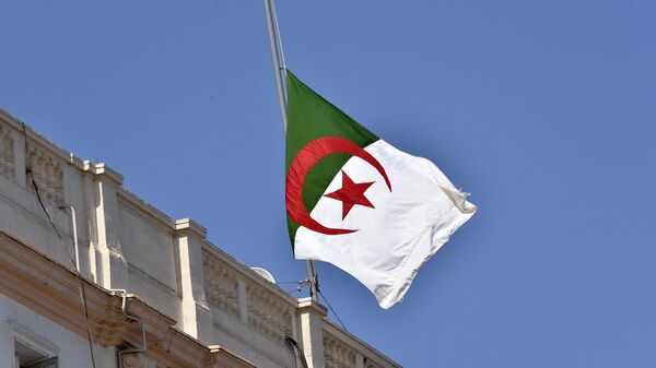The Algerian national flag flies at half mast in the capital Algiers on September 18, 2021, following the death of former president Abdelaziz Bouteflika - Sputnik International