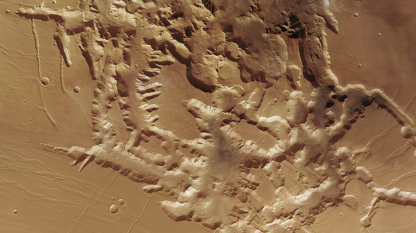 The Noctis Labyrinthus region (Latin for “labyrinth of night”) is located between the western edge of Valles Marineris and the Tharsis upland. It has a length of 1,190 km and is characterized by a system of deep and steep-walled valleys formed by faulting. Many of the valleys show the classical appearance of so-called graben - Sputnik International