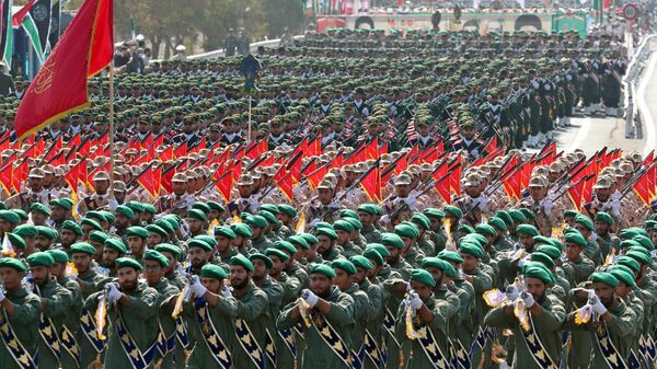 Iranian soldiers march during the annual military parade marking the anniversary of the outbreak of the devastating 1980-1988 war with Saddam Hussein's Iraq, in the capital Tehran on September 22, 2022.  - Sputnik International