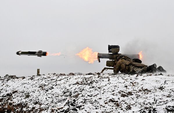 Vega fighters firing an anti-tank guided missile during combat training, LPR. - Sputnik International