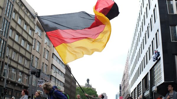 Protest against Angela Merkel's open door immigration policy in Berlin - Sputnik International