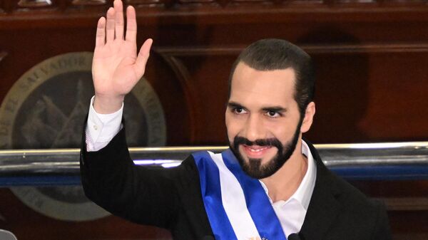 Salvadoran President Nayib Bukele waves after delivering his annual address to the nation marking his fourth year in office at the San Salvador Legislative Assembly on June 1, 2023 - Sputnik International