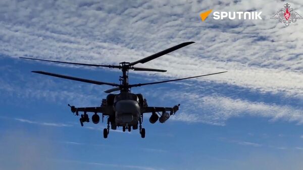 Russian Ka-52 attack helicopter crews strike enemy strongholds - Sputnik International