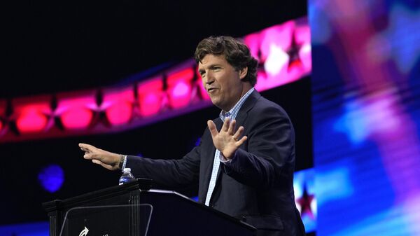 Tucker Carlson speaks at the Turning Point Action conference, Saturday, July 15, 2023, in West Palm Beach, Fla.(AP Photo/Lynne Sladky) - Sputnik International