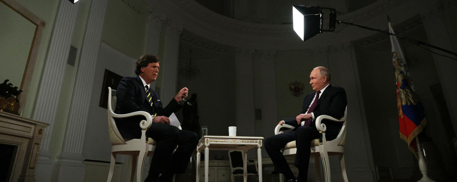 Russian President Vladimir Putin listens to a question during an interview with US journalist Tucker Carlson at the Kremlin in Moscow, Russia. - Sputnik International, 1920, 09.02.2024