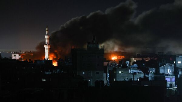 Smoke billows during Israeli bombardment over Rafah in the southern Gaza Strip on February 12, 2024 - Sputnik International