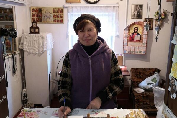 Yelena, the caretaker of Father Michael's temple at the 'Road of Life' in Donetsk
 - Sputnik International