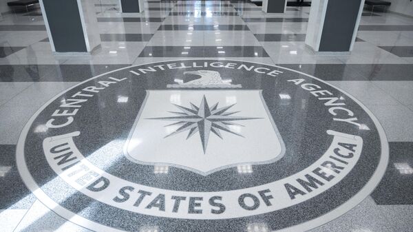 The seal of Central Intelligence Agency is seen in the lobby the headquarters building in Langley, Va., on Saturday, Sept. 24, 2022 - Sputnik International