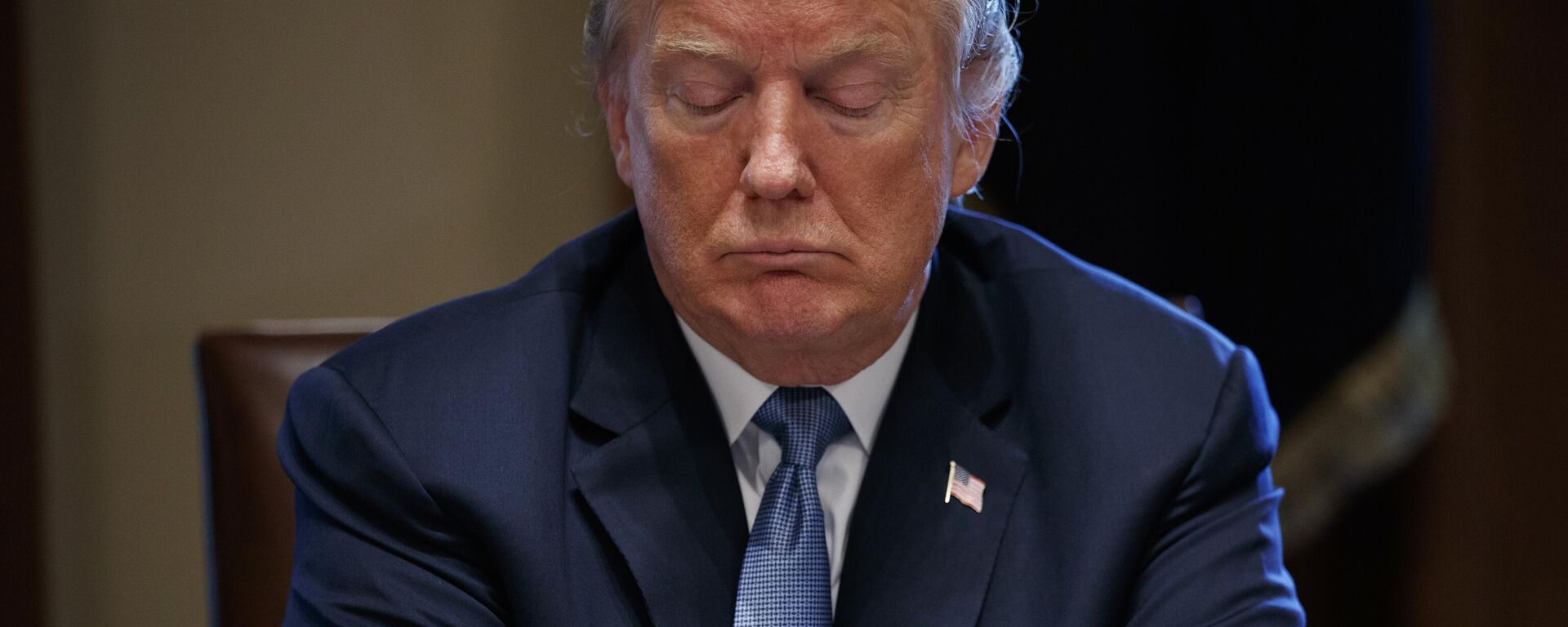 In this June 26, 2018 photo, President Donald Trump listens during a meeting with Republican lawmakers in the Cabinet Room of the White House in Washington - Sputnik International, 1920, 16.02.2024