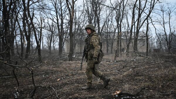A soldier from Russia's Central Military District in Avdeyevka - Sputnik International