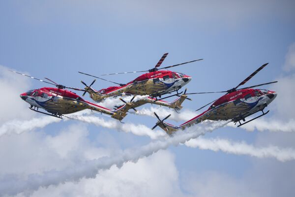 The Sarang Helicopter Display Team of the Indian Air Force (IAF) fly the modified HAL Dhruv helicopters, also known as the Advanced Light Helicopter (ALH).  - Sputnik International