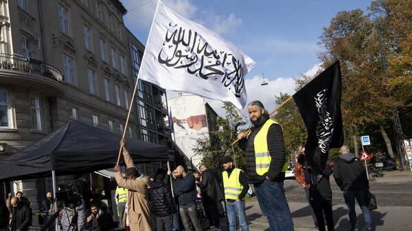 Supporters of the radical Muslim supremacist Salafist extremist group Hizb ut Tahrir (deemed a terrorist group in Russia and many other countries) demonstrate in Copenhagen, Denmark in connection with the Palestinian-Israeli crisis, October 2023. - Sputnik International