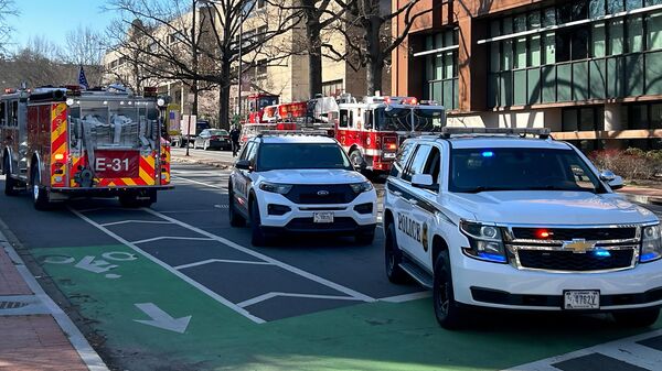 US Secret Service vehicles block access to a street leading to the Embassy of Israel in Washington, DC on February 25, 2024. A man reportedly set  himself on fire near the embassy on Sunday afternoon.  - Sputnik International